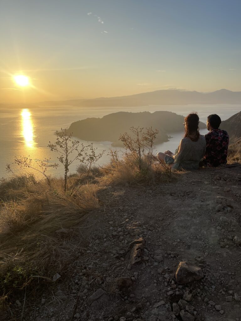 A couple watching the sunrise